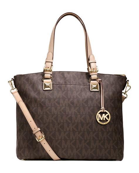 michael kors multifunction tote brown|Michael Kors brown leather backpack.